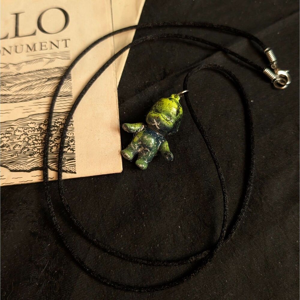 Painted Kewpie Baby Pendant Necklace Green